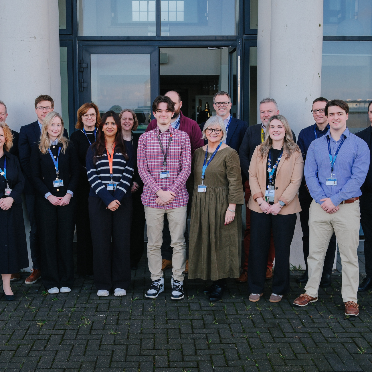 Staff and students stood outside the Winter Gardens smiling