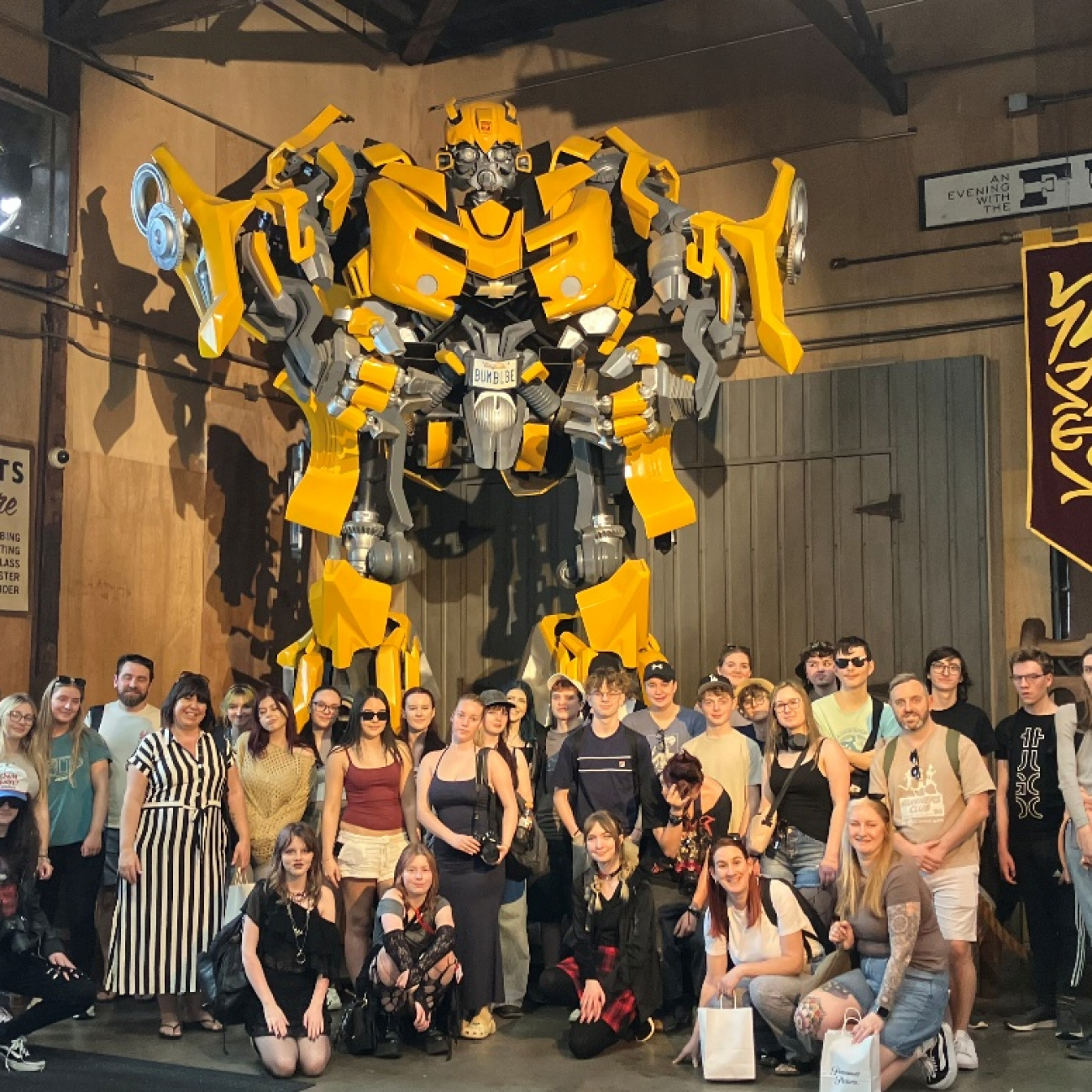 Students standing in front of the Bumblebee transformer