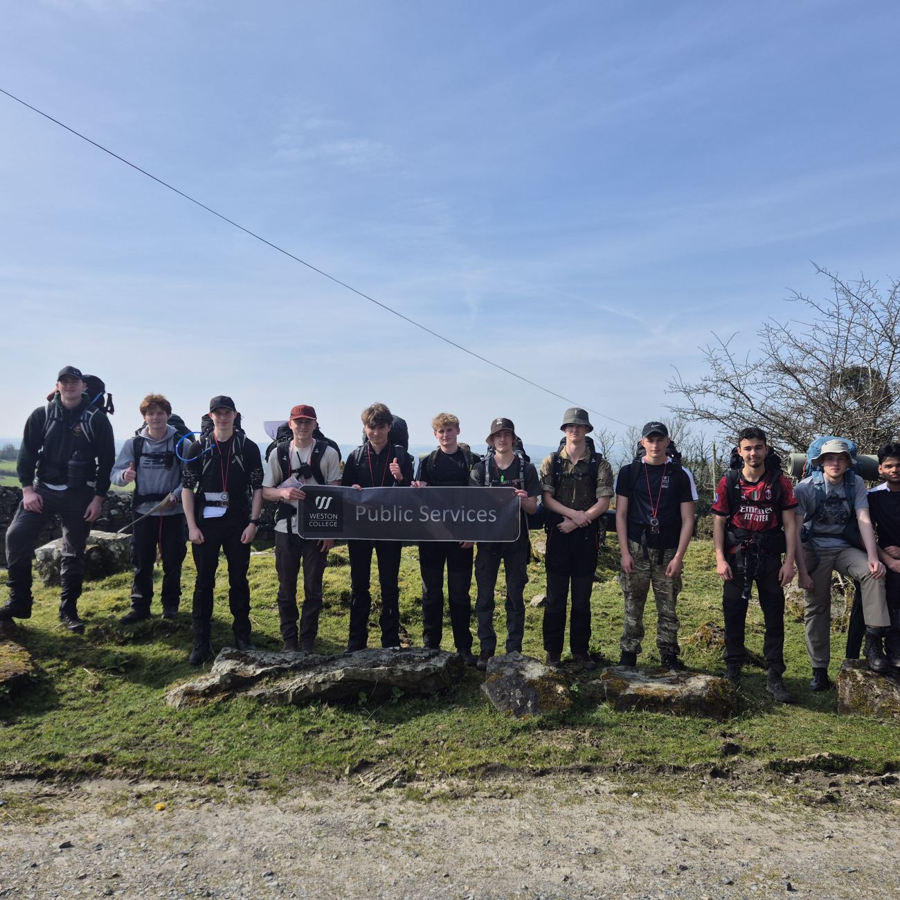 UPS Students standing smiling during their training