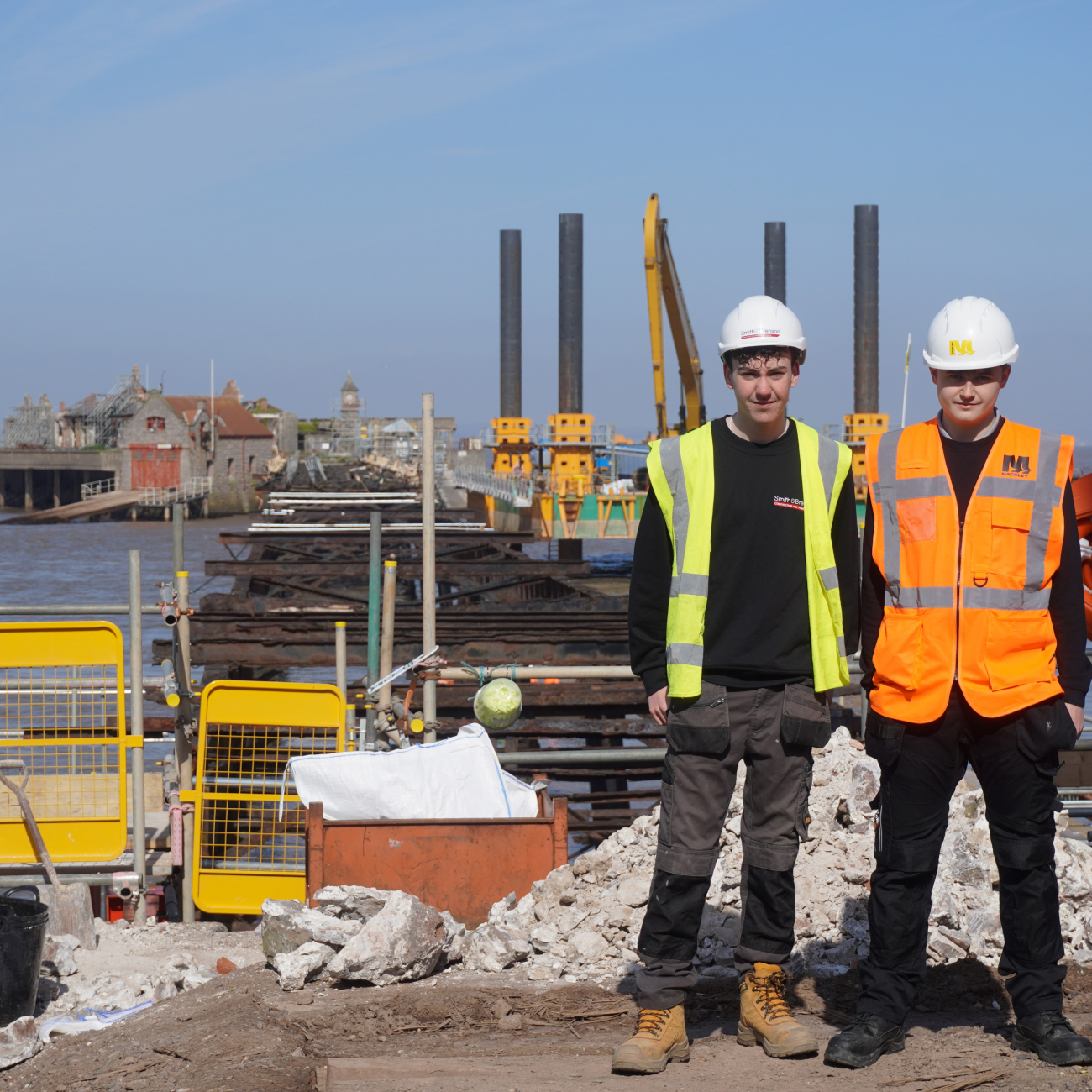 Finton and Ashton stood in front of birnbeck pier