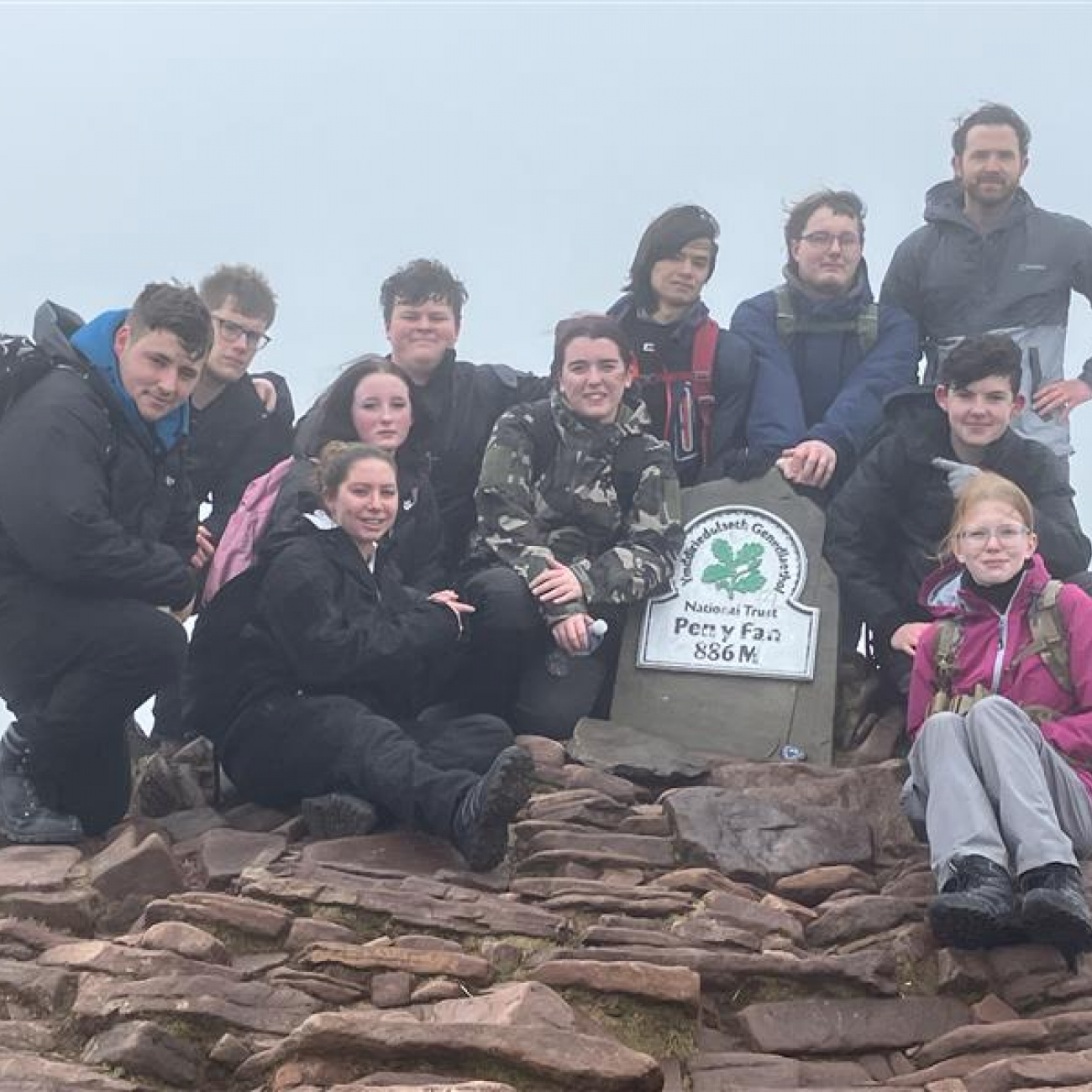 Students next to the Pen Y Fan summit point