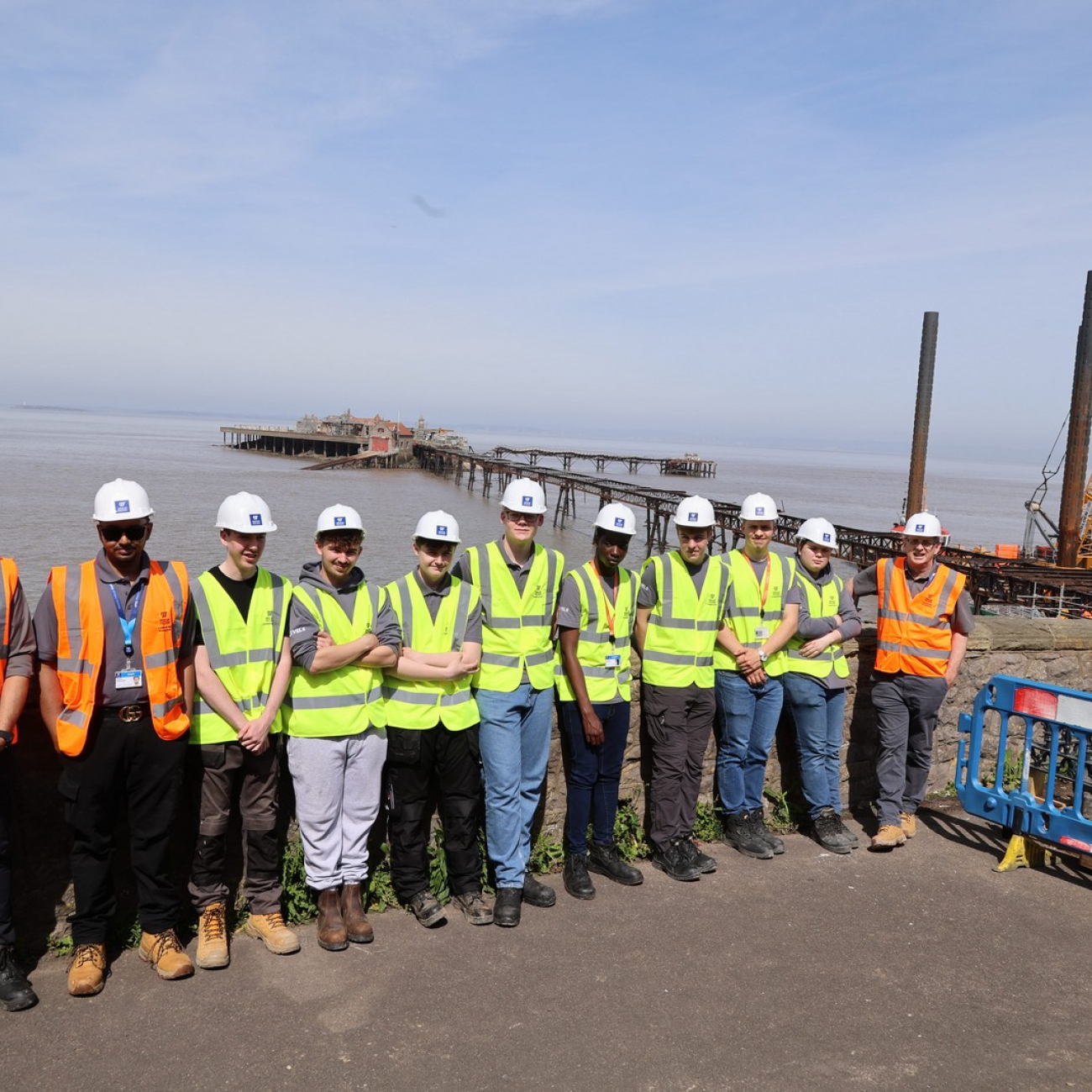 Students Stood Infront of Pier and Jack-Up Barge