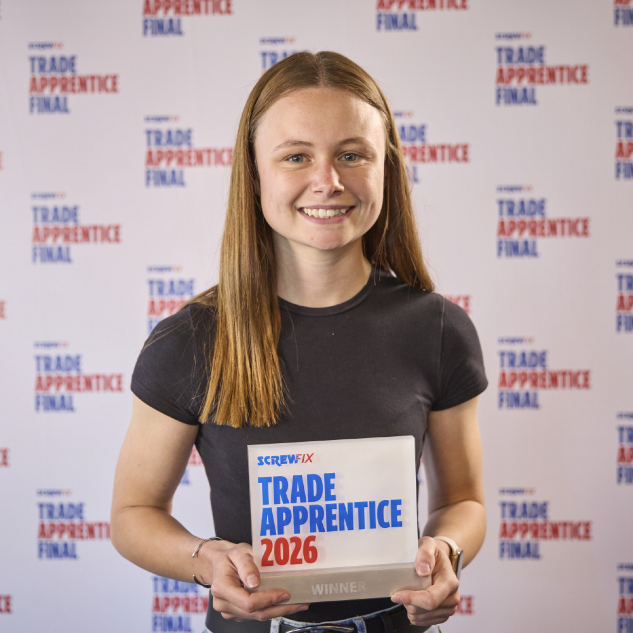 Gracie Donaghy holding her award