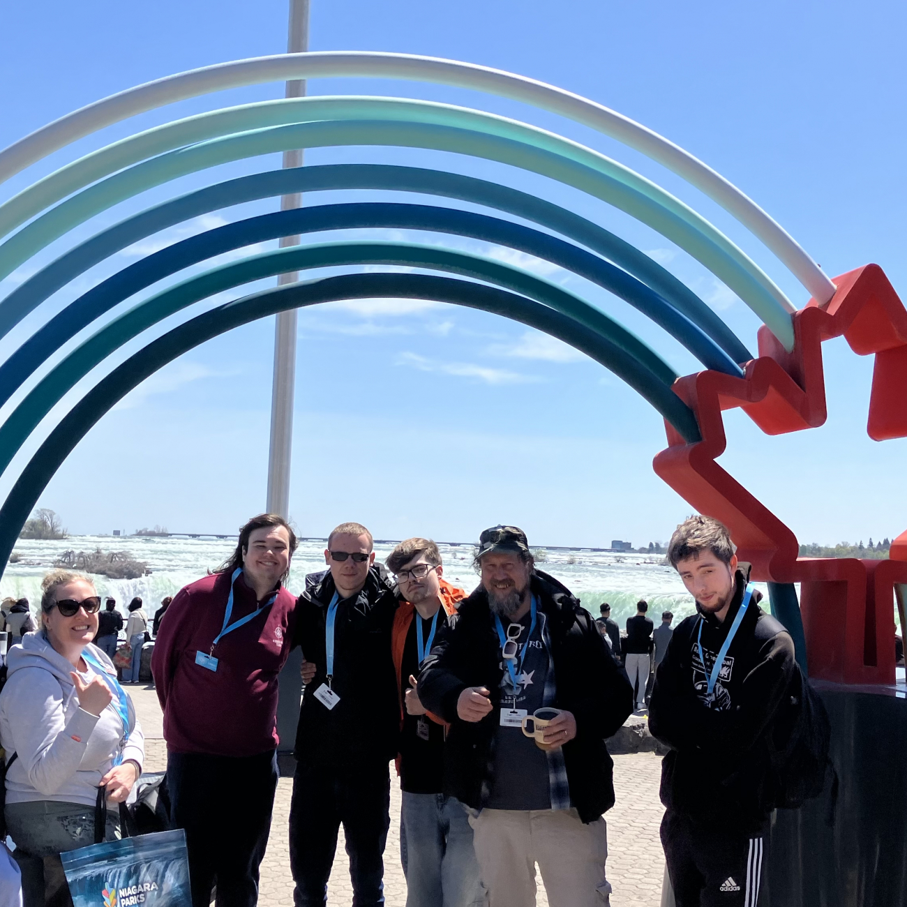 Students posing next to Niagara Falls