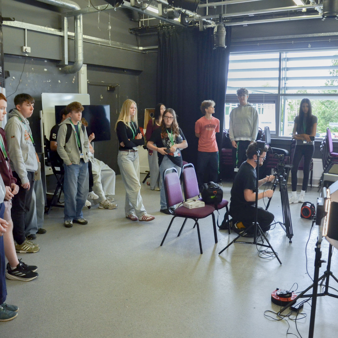 Media students learning how to use the camera