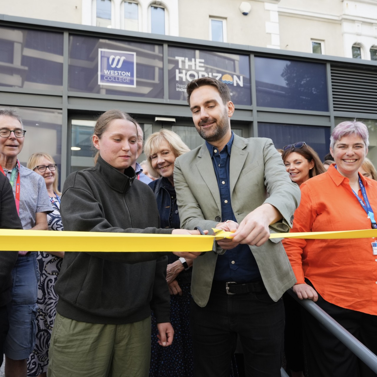 Dan Aldridge MP and Tilly cut the ribbon on the Horizon building 