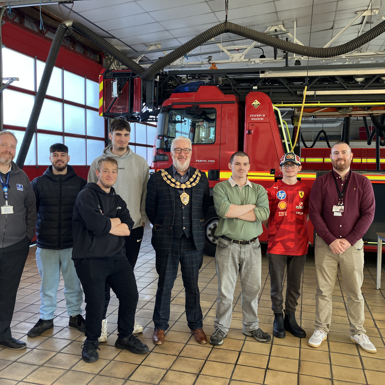Group photo in front of fire truck