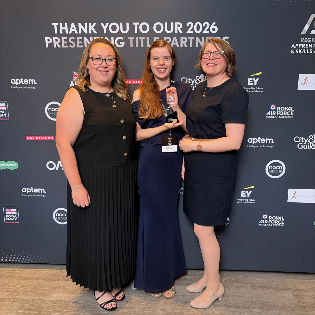 India collecting her award with Ffion and Sarah