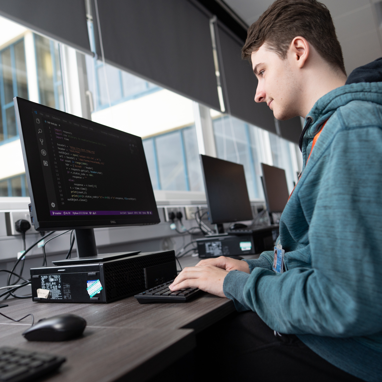 Digital student sat at computer typing