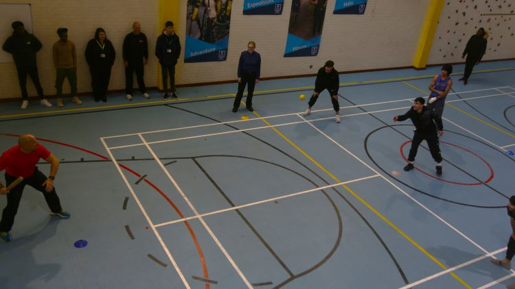 ESOL Learners, police and the fire brigade playing rounders.