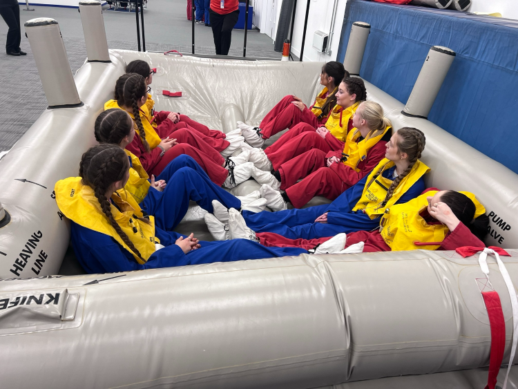 Learners in a mock life-raft