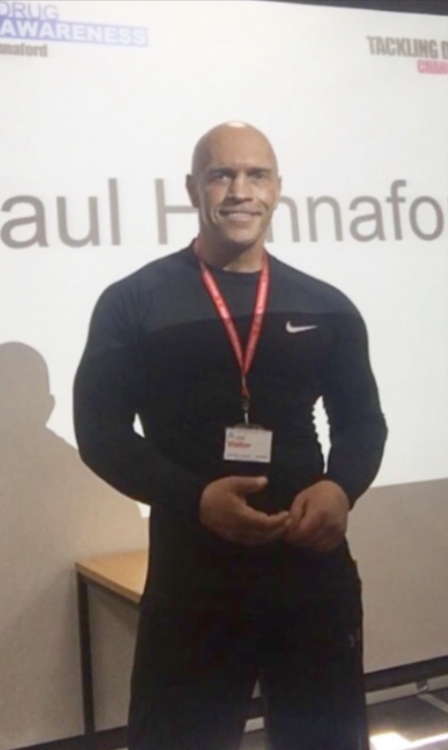 Paul Hannaford smiling at camera at an event