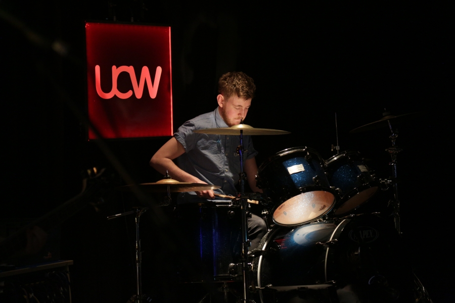 Music student playing the drums for Michael Eavis