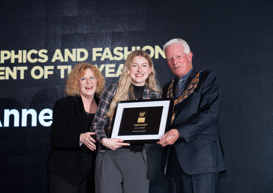 Kitty receiving award