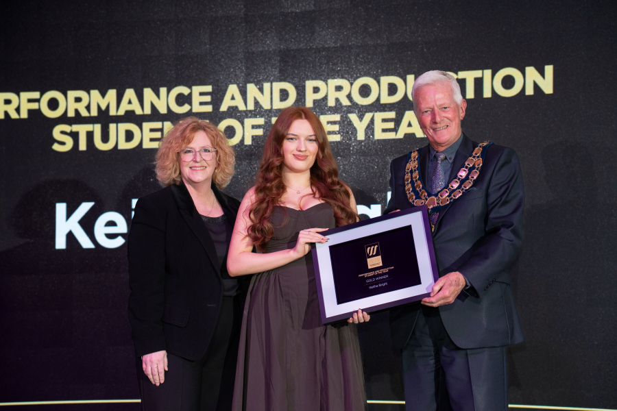 Keitha Accepting Award