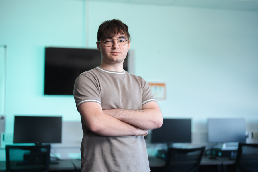 Callum with his arms crossed