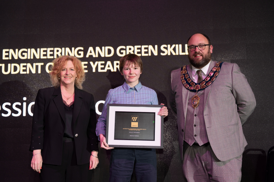 Jessica collecting her award