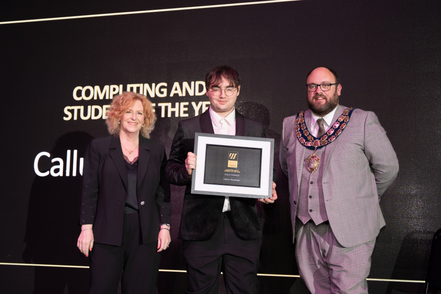 Callum collecting his award