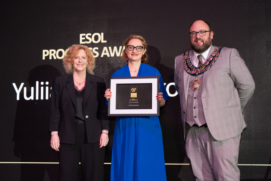 Yuliia collecting award