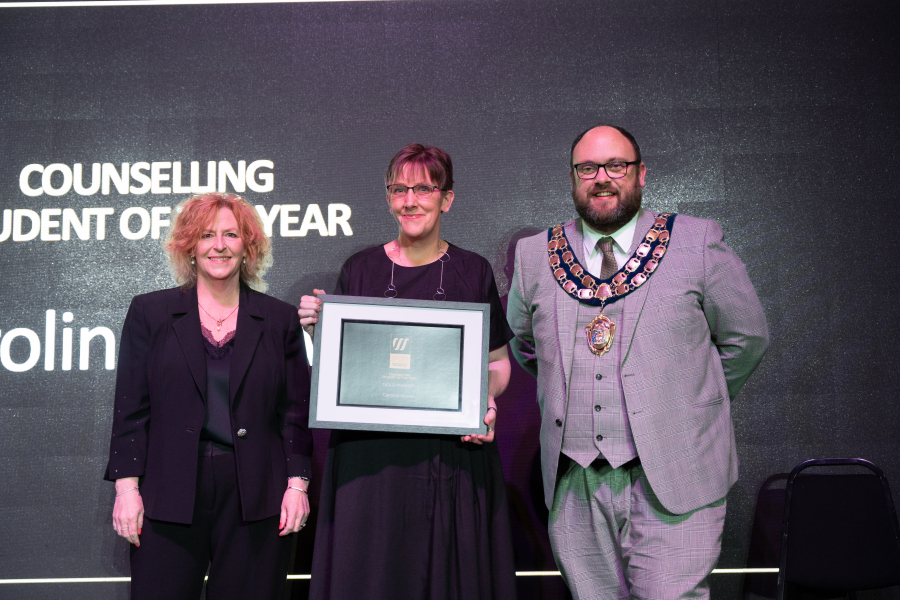 Caroline collecting her award