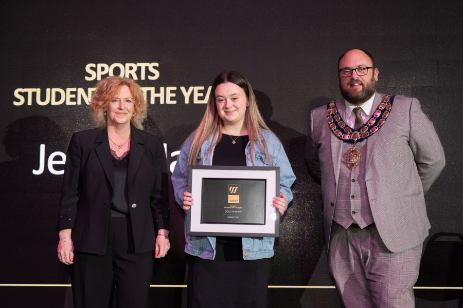 Jessie collecting her award