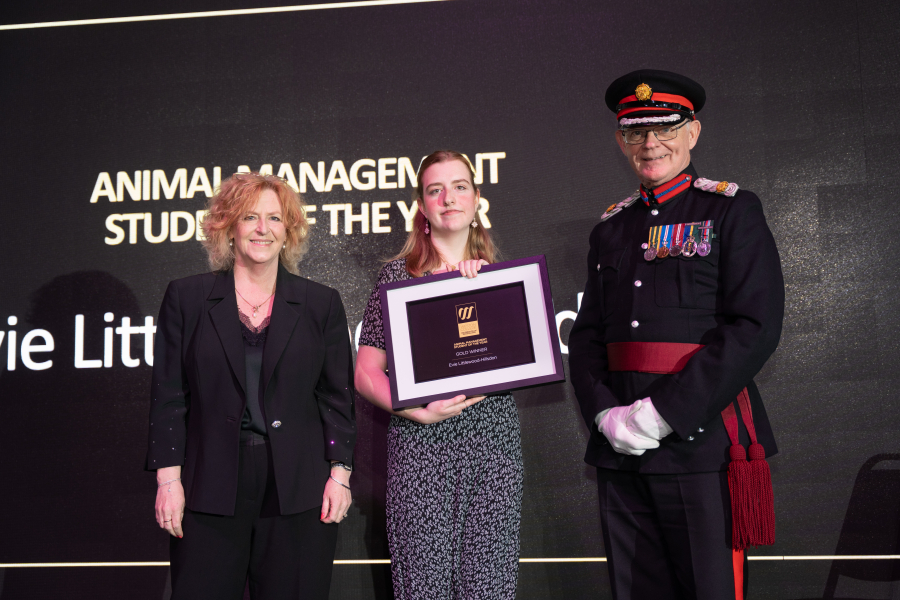 Evie collecting her award