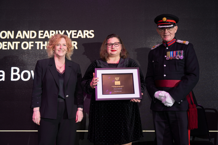 Ewa collecting her award with Principal and Brigadier