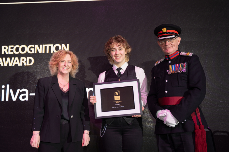 Shay collecting their award