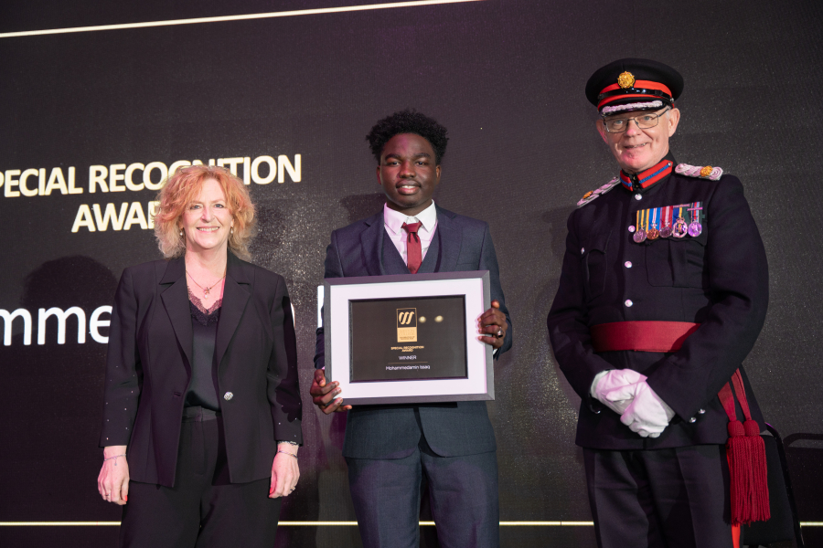 Mohammedamin collecting his award