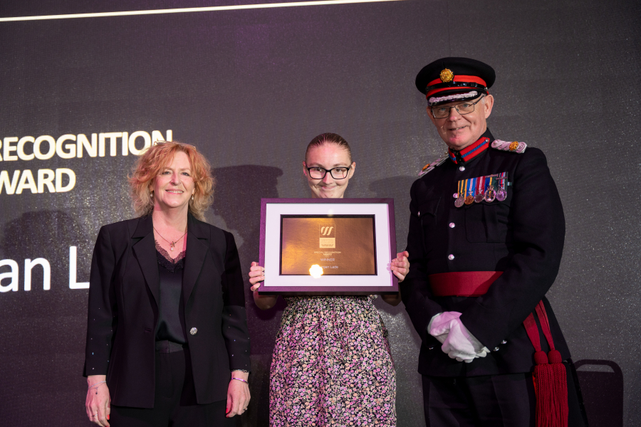 Morgan collecting her award