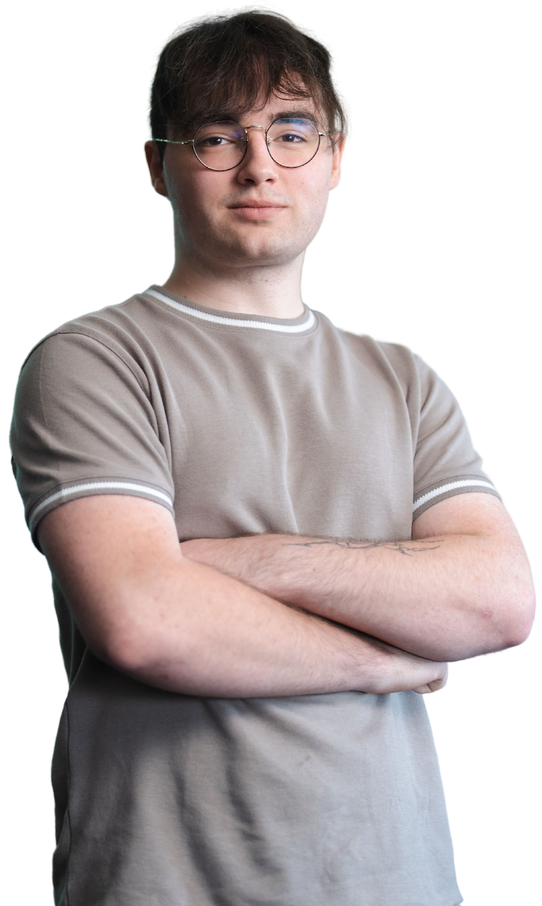 Callum standing with his arms crossed