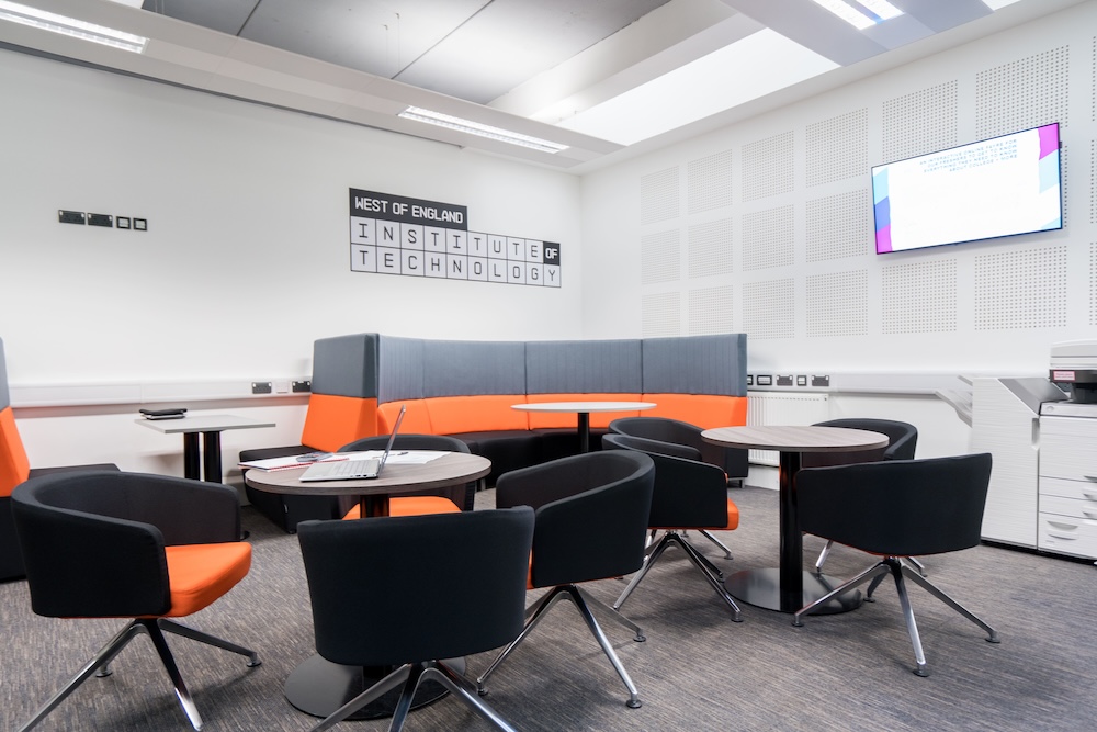 communal room at WEIOT, includes chairs and sofas