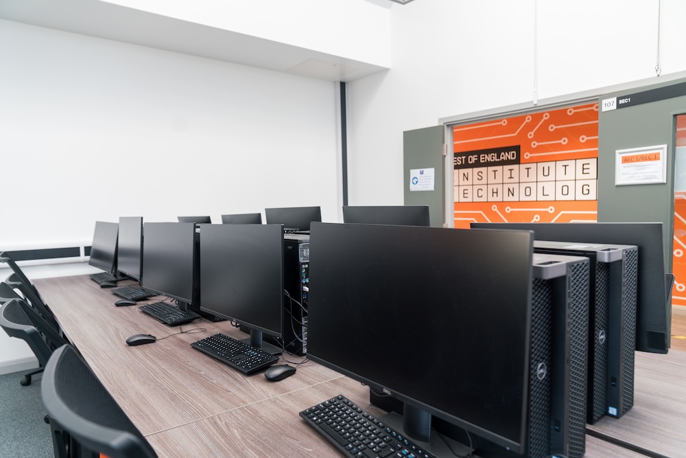 Computers in a computing classroom at WEIOT.